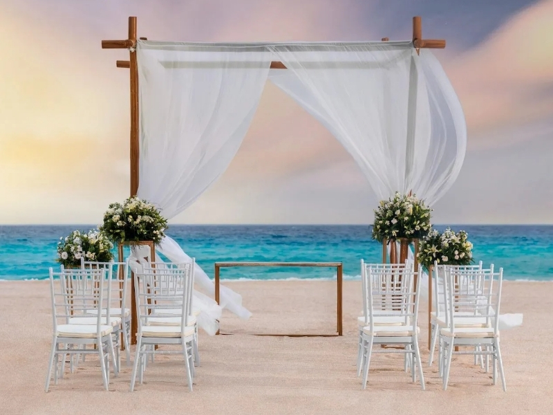 Le Blanc Resort beach wedding setup in Cancun